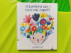 Il bambino con i fiori nei capelli
